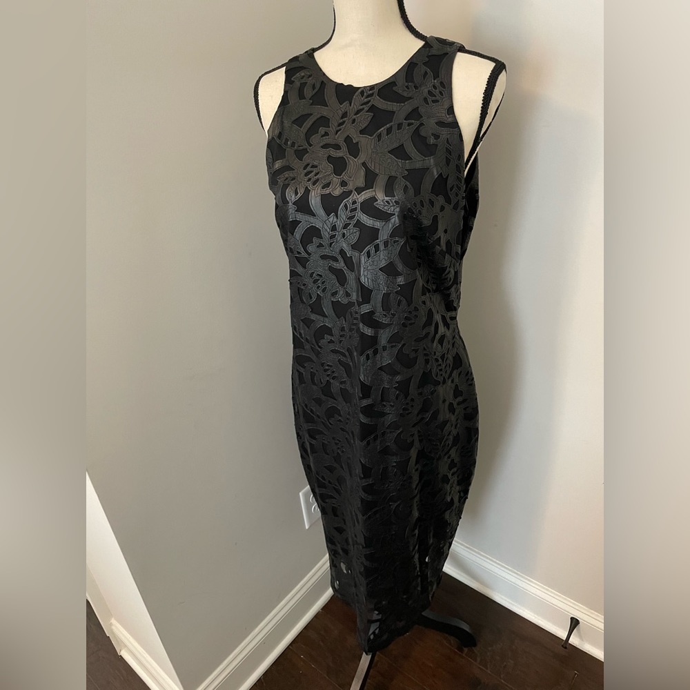 Black sheer & lined dress with leather detail overlay. Size L. Worn once.